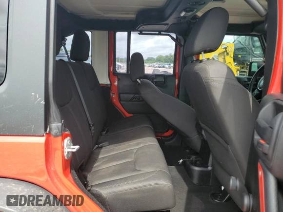 2015 Jeep Wrangler Unlimited Sport with VIN 1C4BJWDG6FL568082, listed as a Copart auction lot 58242945 with 114,637 mi miles and Salvage title. Bid and sale history available at DreamBid. Image 10.