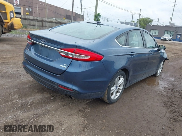 2018 Ford Fusion SE with VIN 3FA6P0HD9JR192927, listed as a IAAI auction lot 42616919 with 90,623 mi miles and . Bid and sale history available at DreamBid. Image 4.