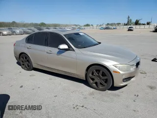 2015 BMW 3 Series 328i with VIN WBA3A5G55FNS84226, listed as a Copart auction lot 50106465 with 122,659 mi miles and Clean title. Bid and sale history available at DreamBid. Image 4.