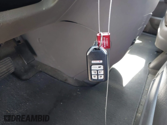 2014 Honda Odyssey Touring with VIN 5FNRL5H99EB133864, listed as a IAAI auction lot 42201359 with 122,490 mi miles and . Bid and sale history available at DreamBid. Image 11.