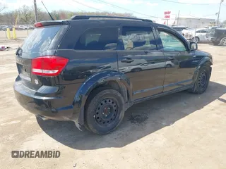 2011 Dodge Journey Mainstreet with VIN 3D4PH1FG2BT516953, listed as a IAAI auction lot 42112461 with 203,909 mi miles and . Bid and sale history available at DreamBid. Image 4.