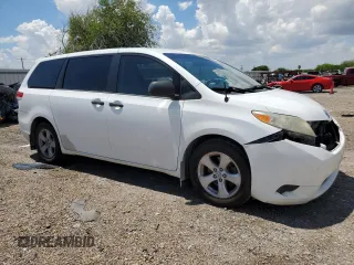 2014 Toyota Sienna L with VIN 5TDZK3DCXES463632, listed as a Copart auction lot 69957284 with 206,250 mi miles and Salvage Title. Bid and sale history available at carsss.com. Image 4.