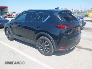 2018 Mazda CX-5 Grand Touring with VIN JM3KFADM2J1324547, listed as a IAAI auction lot 41947497 with 66,254 mi miles. Bid and sale history available at carsss.com. Image 3.