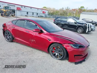 2023 Tesla Model S Plaid with VIN 5YJSA1E67PF525190, listed as a IAAI auction lot 41428301 with Not provided miles and . Bid and sale history available at DreamBid. Image 1.