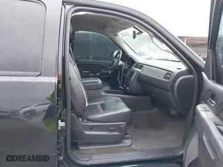 2013 Chevrolet Suburban LT with VIN 1GNSKJE71DR308480, listed as a IAAI auction lot 41695090 with 129,000 mi miles. Bid and sale history available at carsss.com. Image 5.