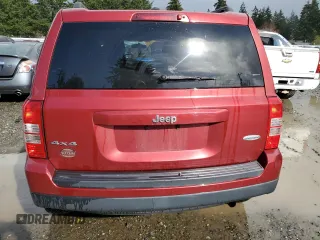 2014 Jeep Patriot Latitude with VIN 1C4NJRFB1ED651525, listed as a Copart auction lot 52526975 with 135,088 mi miles and Salvage Title. Bid and sale history available at carsss.com. Image 6.