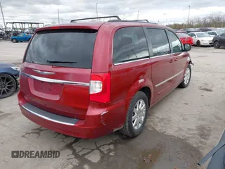 2013 Chrysler Town & Country Touring with VIN 2C4RC1BG4DR604063, listed as a IAAI auction lot 42029869 with 173,309 mi miles. Bid and sale history available at carsss.com. Image 4.