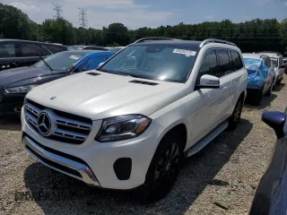 2018 Mercedes-Benz GLS 450 with VIN 4JGDF6EE2JB036295, listed as a Copart auction lot 59556315 with 122,968 mi miles and Clean title. Bid and sale history available at DreamBid. Image 1.