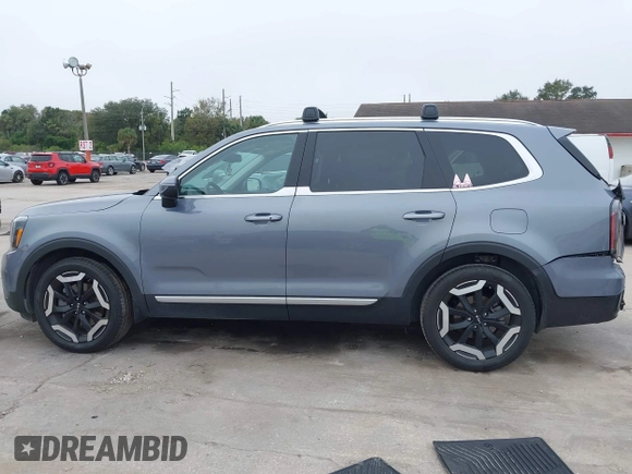 2023 Kia Telluride EX with VIN 5XYP34GC7PG356057, listed as a IAAI auction lot 41475968 with 37,832 mi miles and . Bid and sale history available at DreamBid. Image 14.
