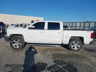 2017 Chevrolet Silverado 1500 LT with VIN 3GCUKREC8HG490827, listed as a IAAI auction lot 41810412 with 121,572 mi miles and . Bid and sale history available at DreamBid. Image 14.