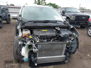 2015 Ford Escape Titanium with VIN 1FMCU0JX7FUB60418, listed as a IAAI auction lot 42485107 with 82,172 mi miles and . Bid and sale history available at DreamBid. Image 12.