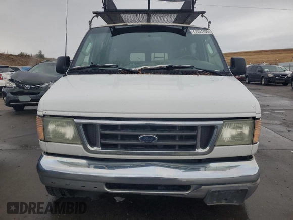 2003 Ford Econoline Passenger XL z VIN 1FBSS31S23HA52924, wystawiony jako Copart lot #77257404 z przebiegiem 170 077 mil mil oraz Nie do naprawy • Non repairable. Historia ofert i sprzedaży dostępna na DreamBid. Obrazek 5.
