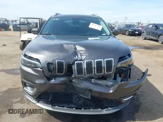 2021 Jeep Cherokee Limited z VIN 1C4PJMDX0MD181058, wystawiony jako IAAI lot #41763166 z przebiegiem 99 123 mil mil oraz . Historia ofert i sprzedaży dostępna na DreamBid. Obrazek 12.