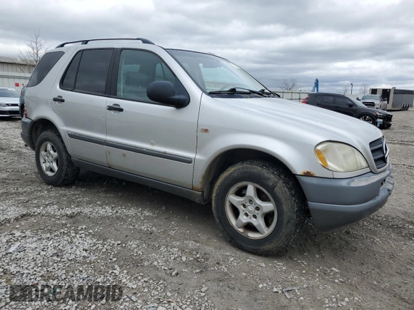 1999 Mercedes-Benz M 320/430/500 with VIN 4JGAB54E9XA127797, listed as a Copart auction lot 51408235 with 243,566 mi miles and Salvage title. Bid and sale history available at DreamBid. Image 4.