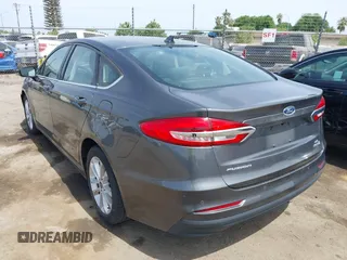 2019 Ford Fusion SE with VIN 3FA6P0LU3KR174108, listed as a IAAI auction lot 42094264 with 87,700 mi miles and . Bid and sale history available at carsss.com. Image 3.