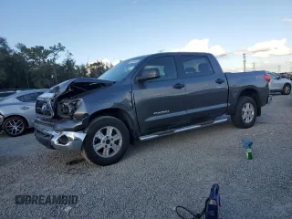 2012 Toyota Tundra with VIN 5TFEM5F14CX049866, listed as a Copart auction lot 85324984 with 125,857 mi miles and Salvage title. Bid and sale history available at DreamBid. Image 1.