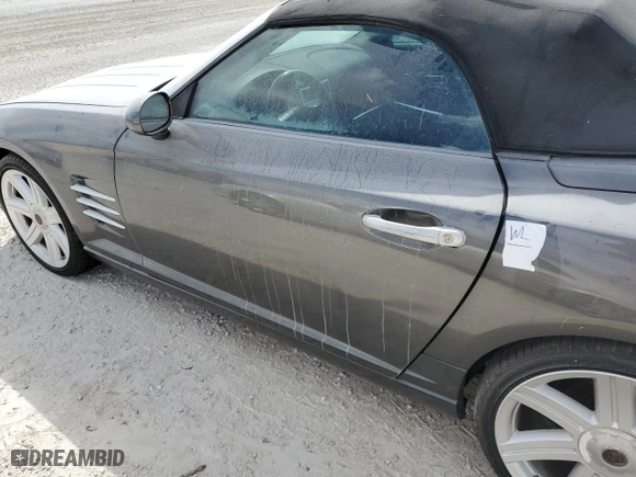 2005 Chrysler Crossfire Limited with VIN 1C3AN65L15X059735, listed as a Copart auction lot 74219534 with 0 mi miles and Non Repairable. Bid and sale history available at carsss.com. Image 12.