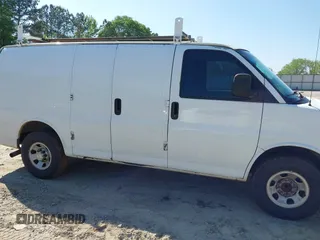 2009 Chevrolet Express Cargo Van with VIN 1GCGG25C791125061, listed as a IAAI auction lot 42131397 with 247,397 mi miles. Bid and sale history available at carsss.com. Image 6.