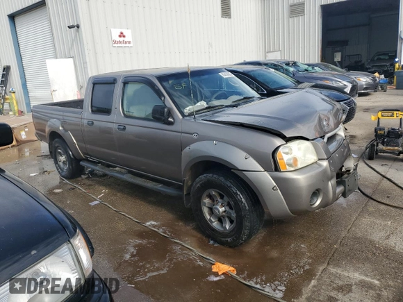 2004 Nissan Frontier XE with VIN 1N6ED29X24C455875, listed as a Copart auction lot 88430605 with 228,936 mi miles and Salvage title. Bid and sale history available at DreamBid. Image 4.
