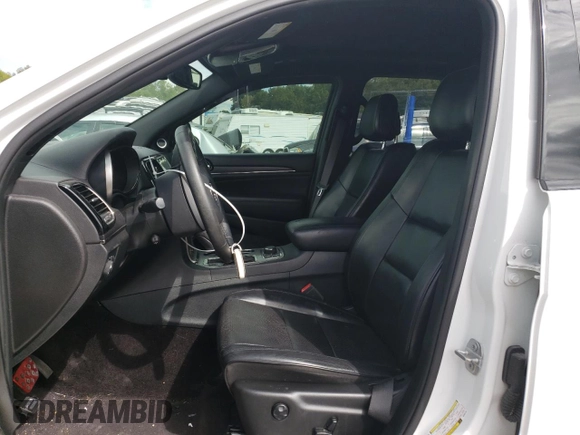2019 Jeep Grand Cherokee High Altitude with VIN 1C4RJFCTXKC564740, listed as a Copart auction lot 71483414 with 82,861 mi miles and Salvage title. Bid and sale history available at DreamBid. Image 7.
