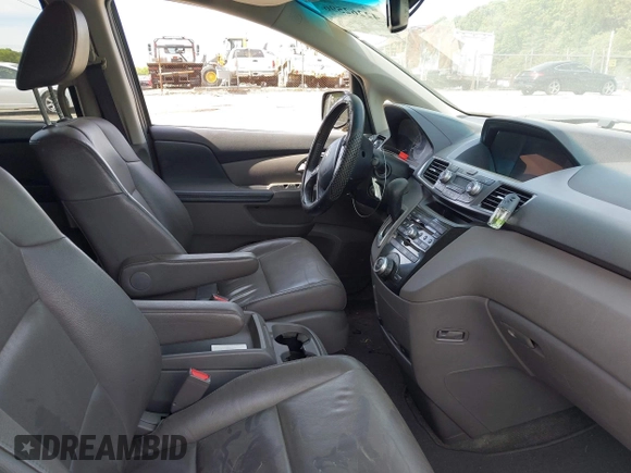 2012 Honda Odyssey EX-L with VIN 5FNRL5H63CB037697, listed as a IAAI auction lot 42262596 with 135,218 mi miles and . Bid and sale history available at DreamBid. Image 5.