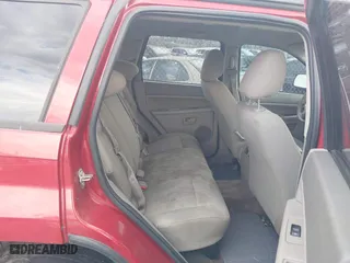 2006 Jeep Grand Cherokee Laredo with VIN 1J4GS48K06C301052, listed as a IAAI auction lot 41602467 with 205,881 mi miles. Bid and sale history available at carsss.com. Image 8.