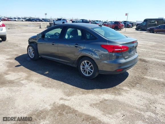 2017 Ford Focus SE with VIN 1FADP3F23HL202077, listed as a IAAI auction lot 41749975 with 67,736 mi miles. Bid and sale history available at carsss.com. Image 3.