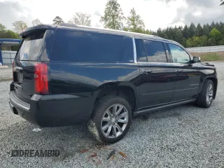 2015 Chevrolet Suburban LTZ with VIN 1GNSKKKC4FR119803, listed as a Copart auction lot 51416775 with 135,366 mi miles and Salvage Title. Bid and sale history available at DreamBid. Image 3.