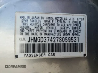 2007 Honda Fit z VIN JHMGD37427S059531, wystawiony jako Copart lot #57025775 z przebiegiem 224 576 mil mil oraz Czysty tytuł • Clean title. Historia ofert i sprzedaży dostępna na DreamBid. Obrazek 12.