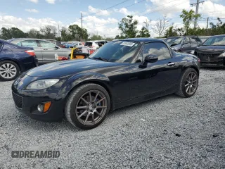 2010 Mazda MX-5 Miata Grand Touring z VIN JM1NC2FF4A0205505, wystawiony jako Copart lot #51643095 z przebiegiem 89 054 mil mil oraz Szkoda całkowita • Salvage title. Historia ofert i sprzedaży dostępna na DreamBid. Obrazek 1.