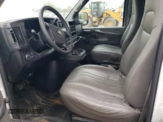 2010 Chevrolet Express Cargo Van with VIN 1GCUGADX5A1176855, listed as a Copart auction lot 49880964 with 198,739 mi miles and Salvage Title. Bid and sale history available at carsss.com. Image 7.