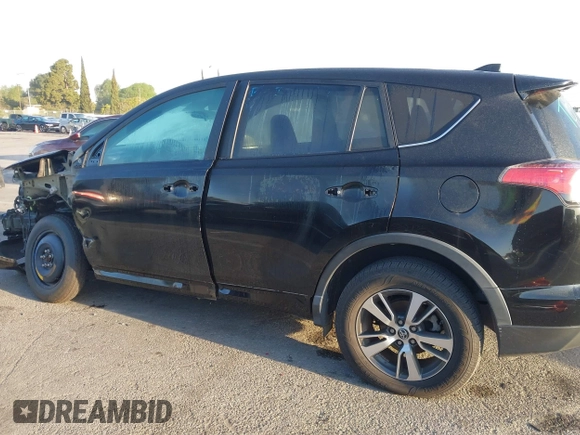 2018 Toyota RAV4 XLE with VIN 2T3WFREV2JW483635, listed as a IAAI auction lot 41856177 with 94,710 mi miles. Bid and sale history available at carsss.com. Image 15.