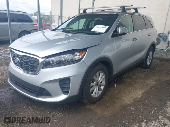 2019 Kia Sorento LX z VIN 5XYPGDA58KG482726, wystawiony jako IAAI lot #42192199 z przebiegiem 79 545 mil mil oraz . Historia ofert i sprzedaży dostępna na DreamBid. Obrazek 17.