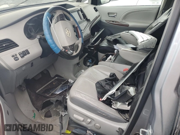 2012 Toyota Sienna XLE with VIN 5TDDK3DCXCS037172, listed as a Copart auction lot 48999165 with 0 mi miles and Salvage Title. Bid and sale history available at carsss.com. Image 7.