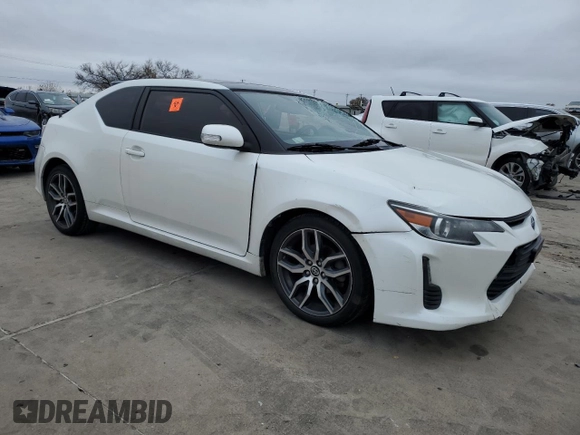 2016 Scion tC with VIN JTKJF5C73GJ019812, listed as a Copart auction lot 84228844 with 153,692 mi miles and Salvage Title. Bid and sale history available at carsss.com. Image 4.