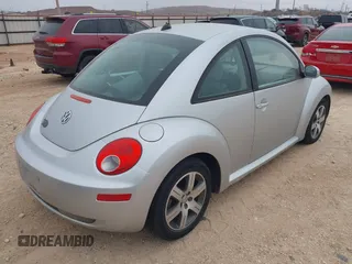 2006 Volkswagen New Beetle Coupe with VIN 3VWRW31C26M411211, listed as a IAAI auction lot 41513856 with 120,114 mi miles. Bid and sale history available at carsss.com. Image 4.