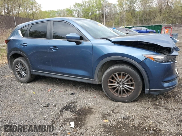 2017 Mazda CX-5 Touring with VIN JM3KFBCL3H0163513, listed as a Copart auction lot 53090045 with 151,675 mi miles and Clean Title. Bid and sale history available at carsss.com. Image 4.
