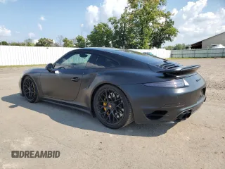2014 Porsche 911 Turbo with VIN WP0AD2A90ES167116, listed as a Copart auction lot 69284504 with 67,701 mi miles and Salvage Title. Bid and sale history available at carsss.com. Image 2.