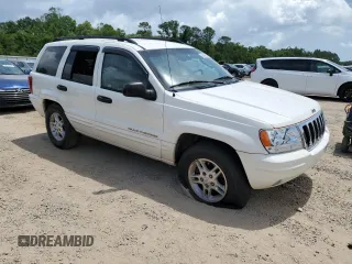 2002 Jeep Grand Cherokee Laredo z VIN 1J4GX48SX2C292081, wystawiony jako Copart lot #54246255 z przebiegiem 167 082 mil mil oraz Szkoda całkowita • Salvage title. Historia ofert i sprzedaży dostępna na DreamBid. Obrazek 4.