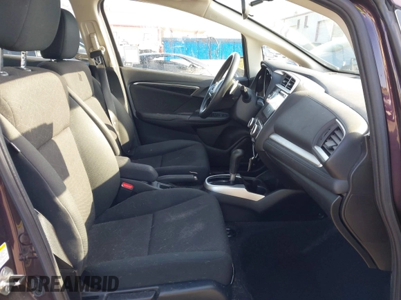 2016 Honda Fit EX with VIN JHMGK5H7XGS013097, listed as a IAAI auction lot 42290807 with 62,352 mi miles and . Bid and sale history available at DreamBid. Image 5.