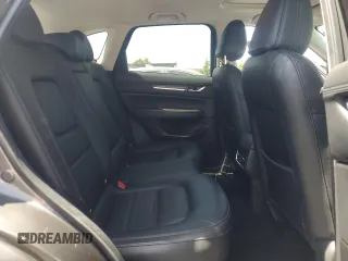 2018 Mazda CX-5 Grand Touring with VIN JM3KFADM3J1389911, listed as a Copart auction lot 60530295 with 103,177 mi miles and Salvage title. Bid and sale history available at DreamBid. Image 11.