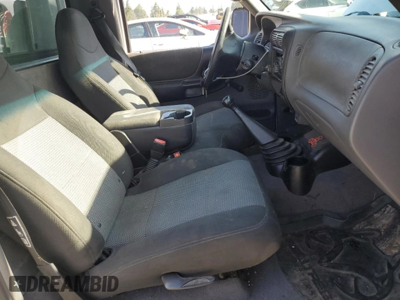 2003 Ford Ranger XL z VIN 1FTYR10D53PA15770, wystawiony jako Copart lot #59225135 z przebiegiem 171 684 mil mil oraz Szkoda całkowita • Salvage title. Historia ofert i sprzedaży dostępna na DreamBid. Obrazek 7.