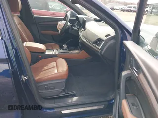 2021 Audi Q5 Premium Plus with VIN WA1BAAFY4M2051403, listed as a IAAI auction lot 40765677 with 30,496 mi miles. Bid and sale history available at carsss.com. Image 5.