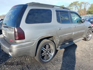 2003 GMC Envoy SLT z VIN 1GKET16S536201569, wystawiony jako IAAI lot #41109902 z przebiegiem Nie podano mil oraz . Historia ofert i sprzedaży dostępna na DreamBid. Obrazek 4.