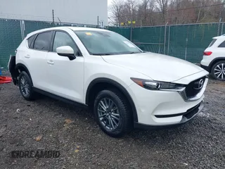 2017 Mazda CX-5 Touring with VIN JM3KFBCL0H0194153, listed as a IAAI auction lot 41999920 with 105,839 mi miles. Bid and sale history available at carsss.com. Image 1.