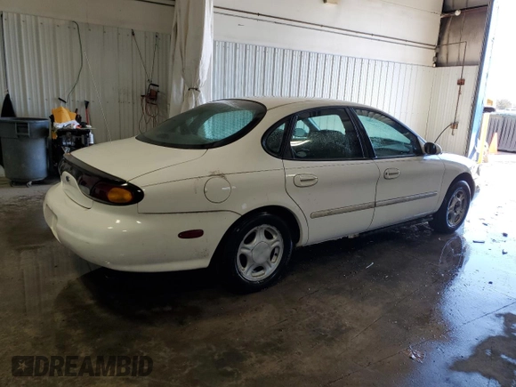 1997 Ford Taurus GL z VIN 1FALP52U5VA148108, wystawiony jako Copart lot #48343435 z przebiegiem 153 082 mil mil oraz Szkody całkowita. Historia ofert i sprzedaży dostępna na DreamBid. Obrazek 3.