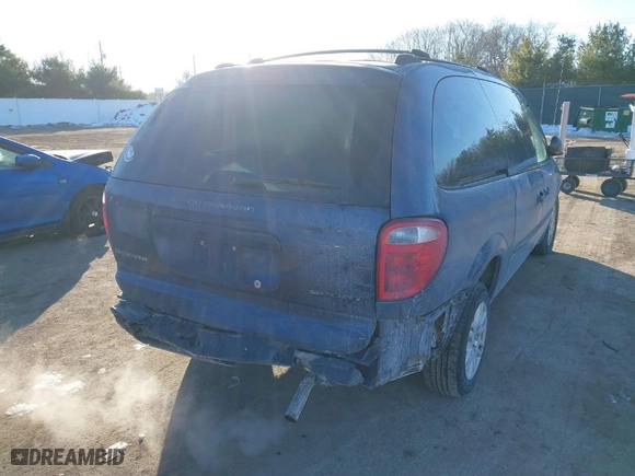 2003 Dodge Caravan Sport with VIN 2D4GP44L33R128512, listed as a IAAI auction lot 41422480 with 146,341 mi miles. Bid and sale history available at carsss.com. Image 6.