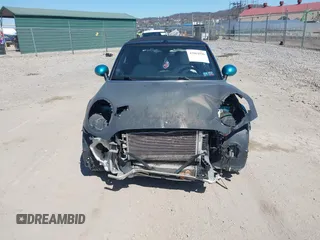 2016 MINI Convertible z VIN WMWWG5C53G3C18842, wystawiony jako IAAI lot #41864596 z przebiegiem 91 253 mil mil oraz . Historia ofert i sprzedaży dostępna na DreamBid. Obrazek 12.