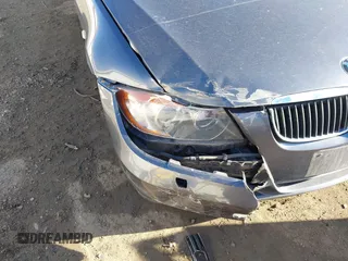 2006 BMW 3 Series 330xi with VIN WBAVD335X6KV66101, listed as a IAAI auction lot 41965628 with 142,246 mi miles. Bid and sale history available at carsss.com. Image 6.