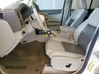 2008 Jeep Commander Limited with VIN 1J8HH58N28C130633, listed as a Copart auction lot 61009065 with 206,121 mi miles and Salvage title. Bid and sale history available at DreamBid. Image 7.